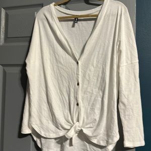 White bathing suit cover up.